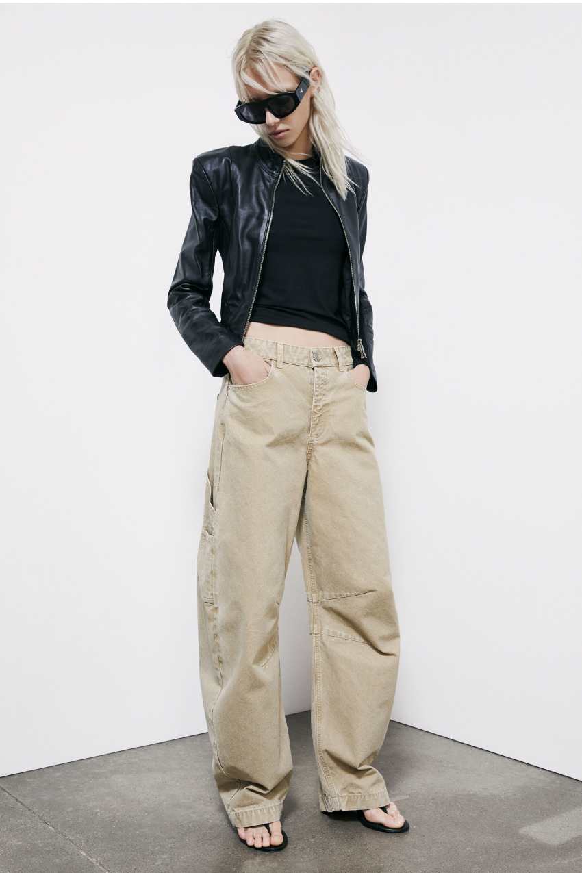 Giacca biker in pelle con inserti in maglia