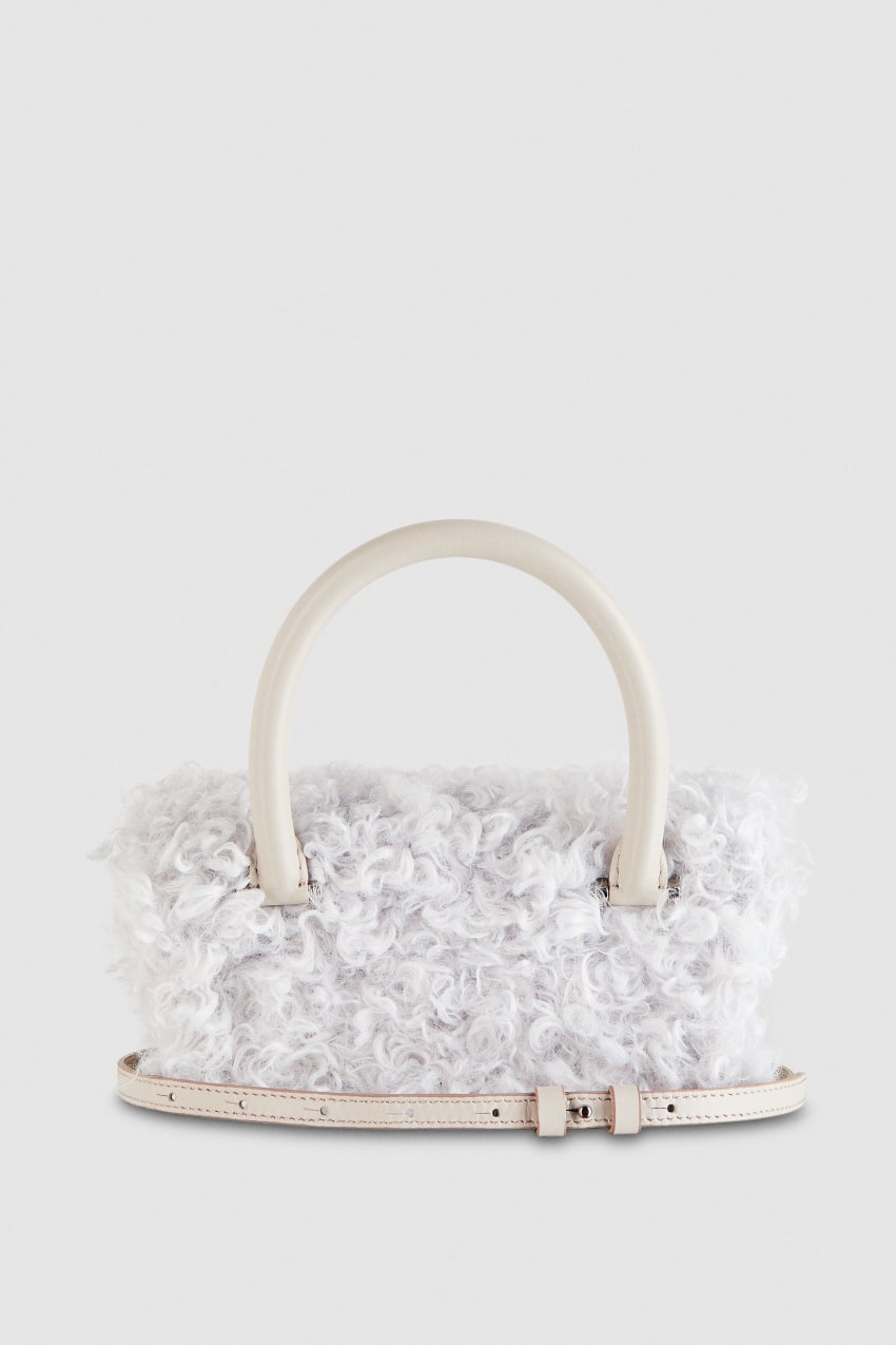 White fuzzy best sale bag
