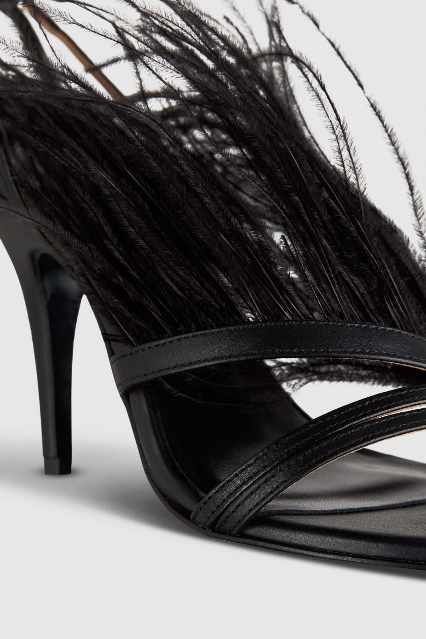 Black feather strap heels top