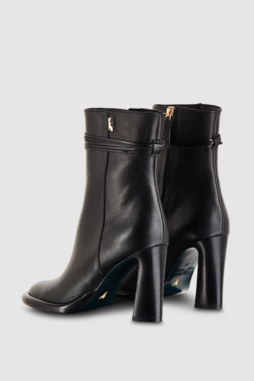 Zip up leather ankle boots
