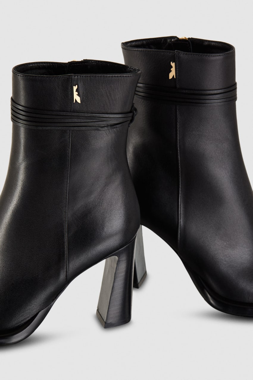 Zip up leather ankle boots