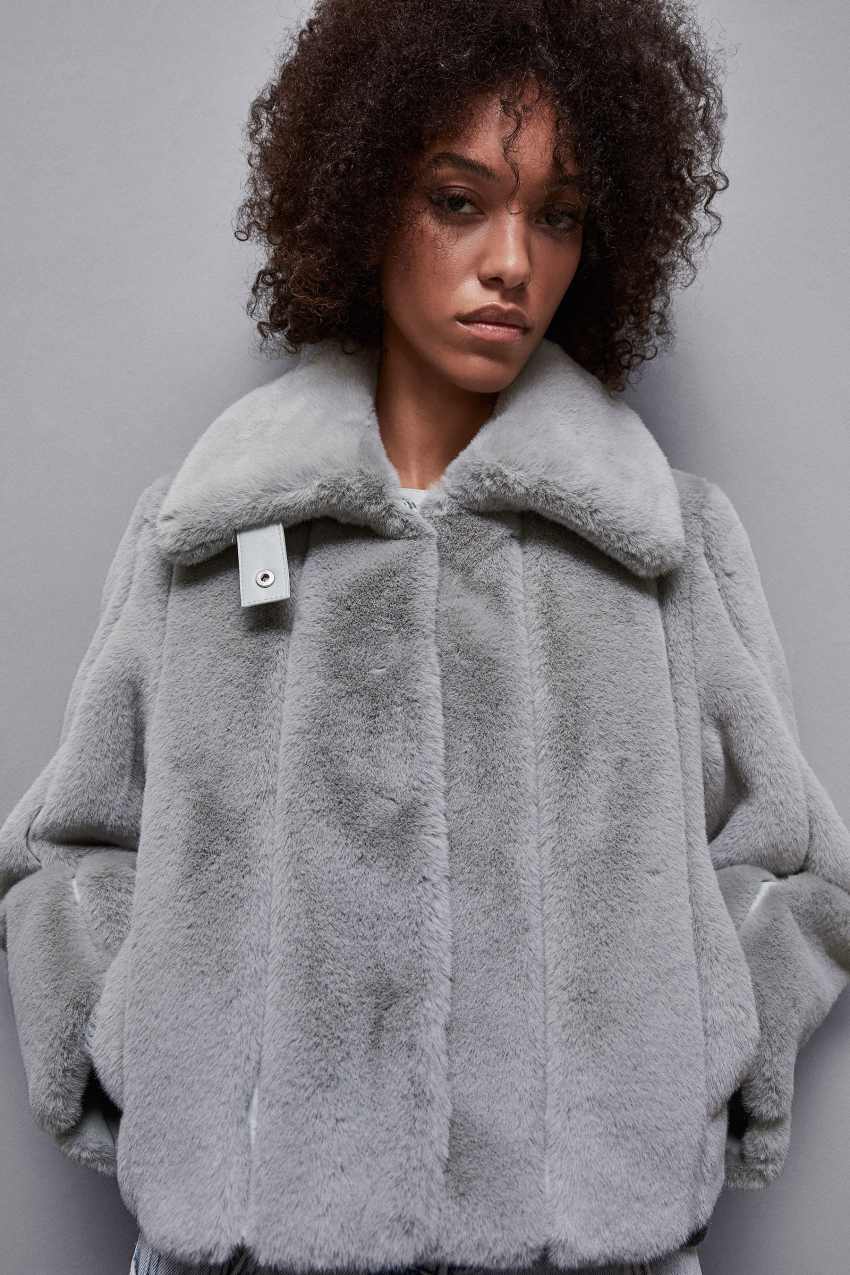Synthetic coats top