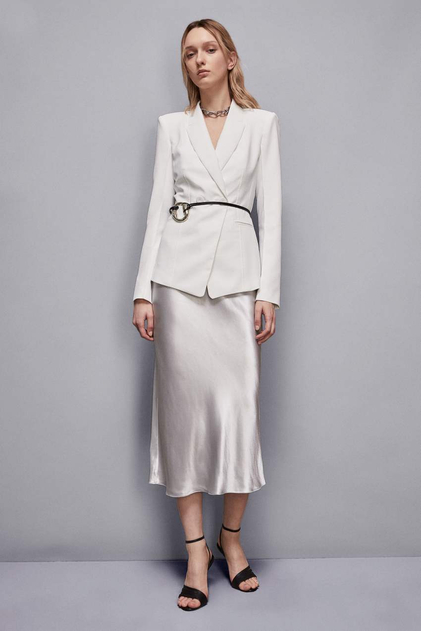 Gonna in raso fluido