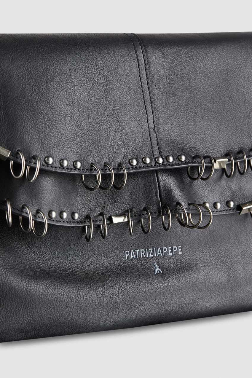 Leather shoulder bag with studs and appliqués | Black