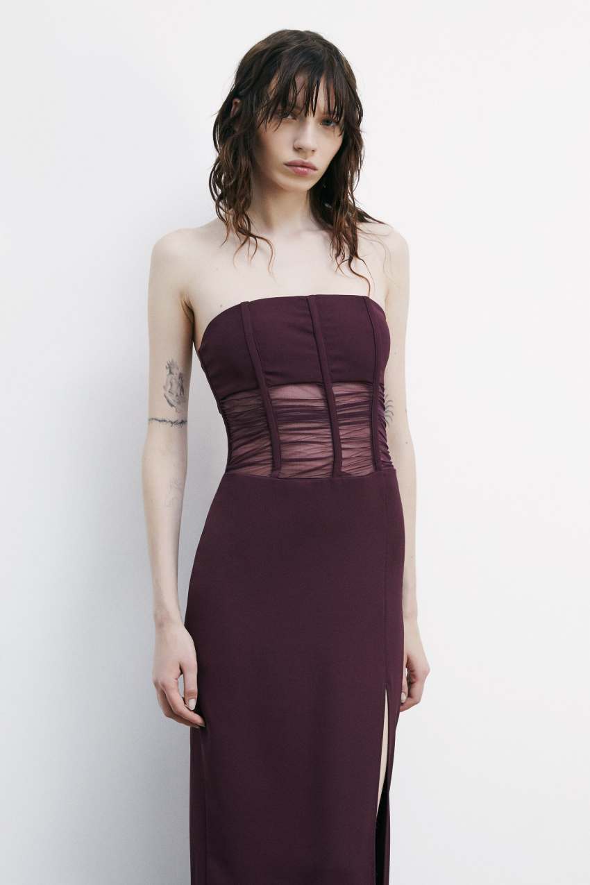 Abito lungo a fascia con corpetto e spacco