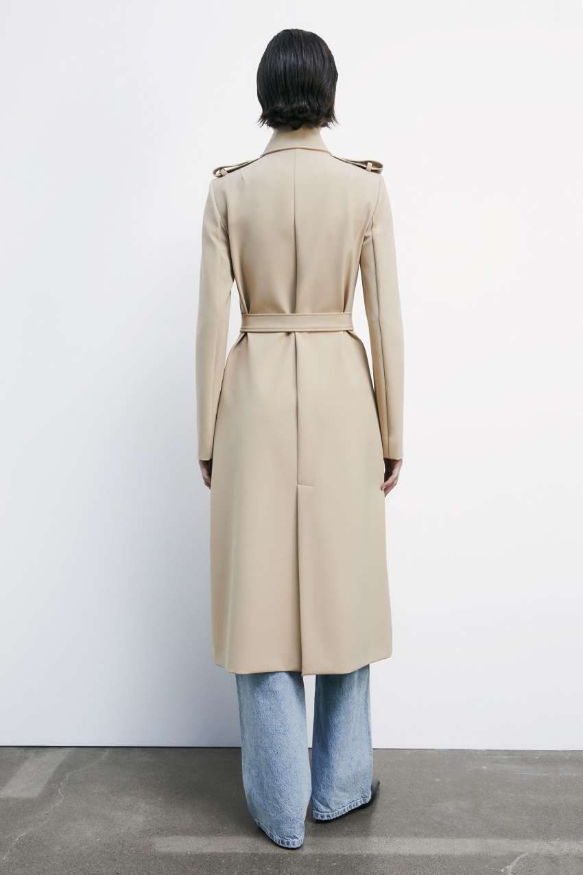 Trench coat with buckle made of bielastic nylon