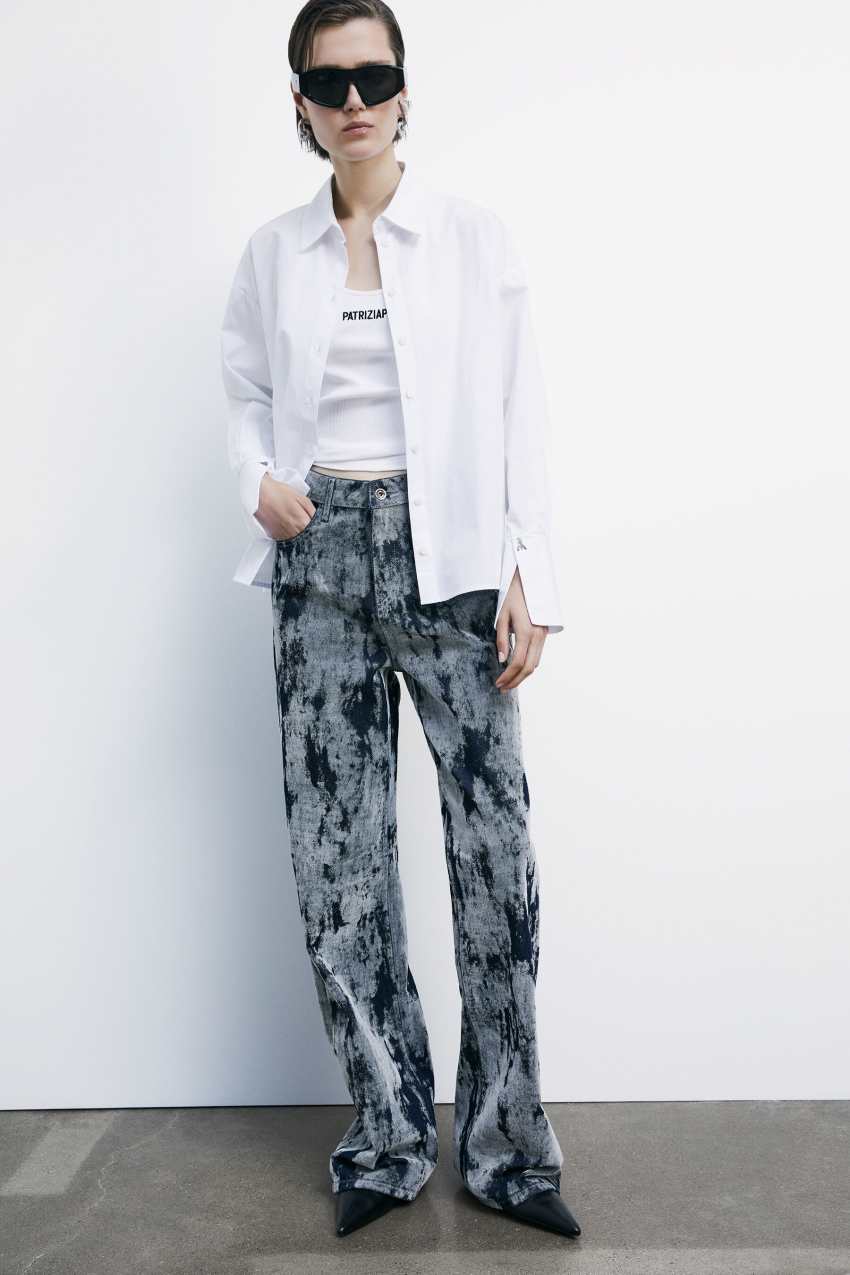 Jeans ampi con stampa flock