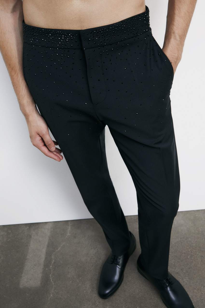 Pantaloni slim in frescolana con strass