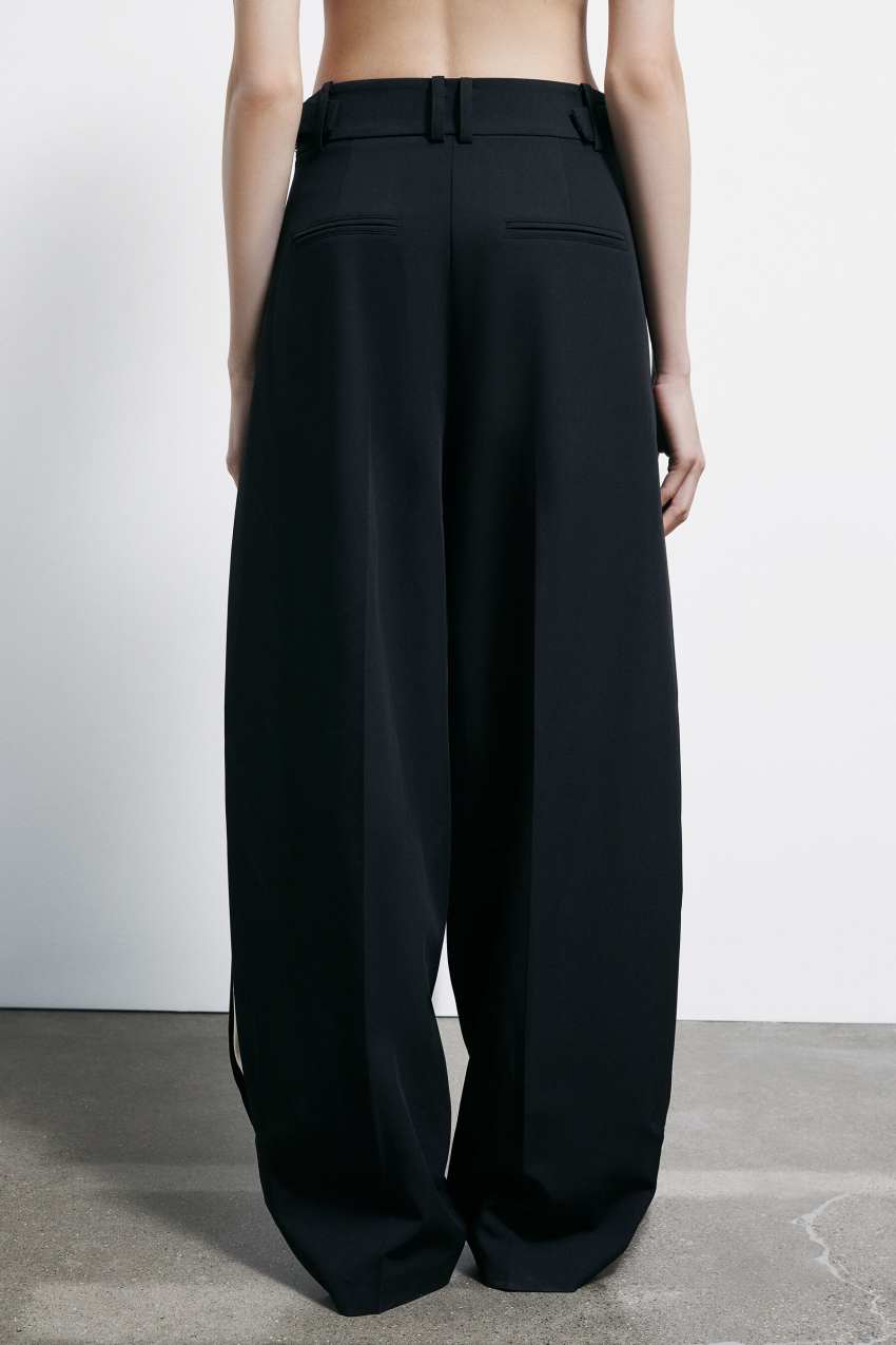 Palazzo pants with satin inserts