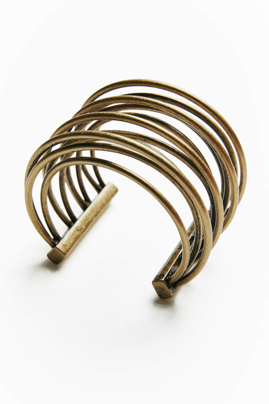 Brazalete de lat&oacute;n, Oro