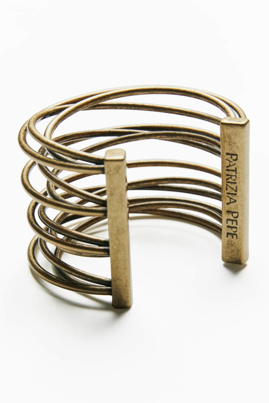 Brazalete de lat&oacute;n, Oro